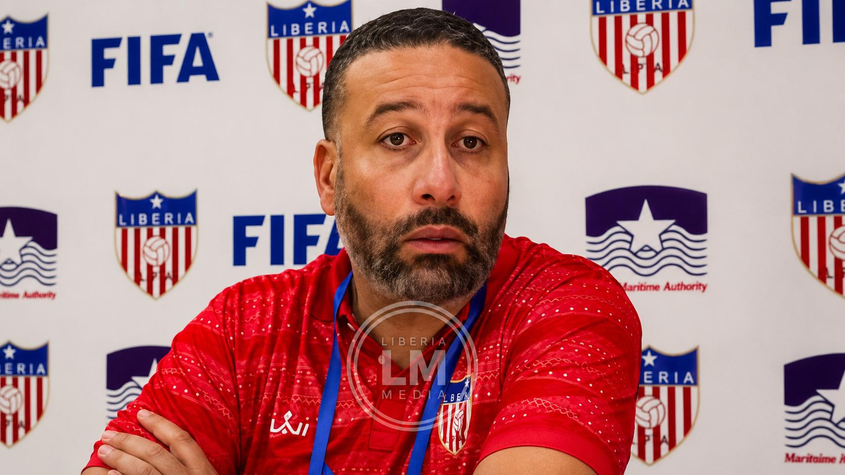 Liberia national team head coach Mohammed Erradi speaks during a post-match press conference following Liberia's victory over Sierra Leone