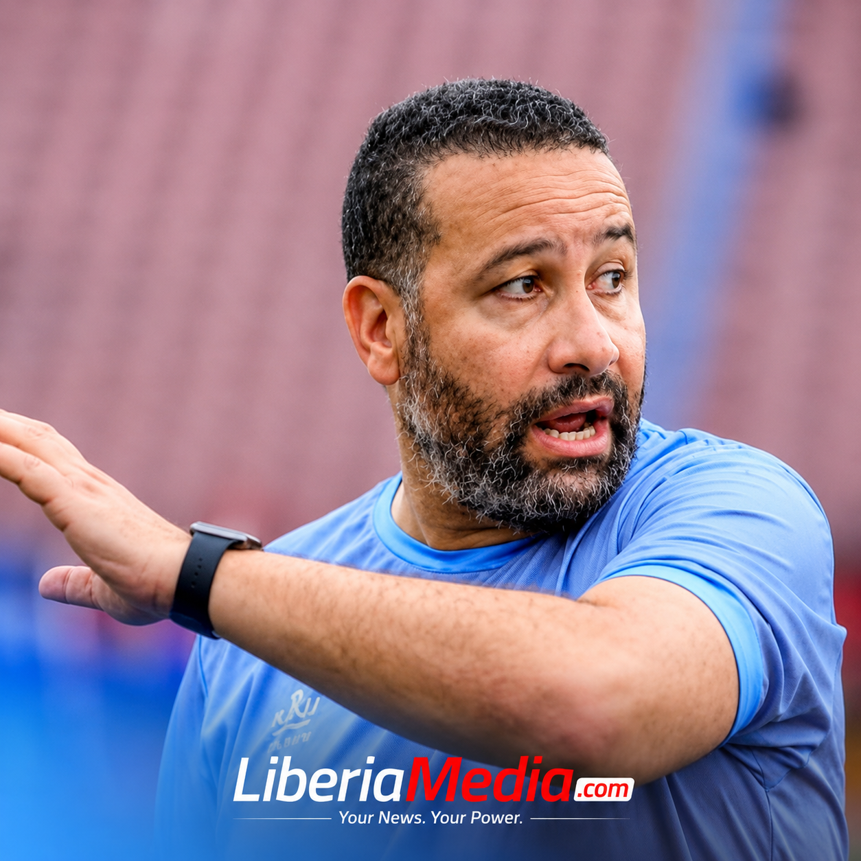 Liberia national team head coach Mohammed Adil Erradi gives instructions during a training session ahead of an international football match.
